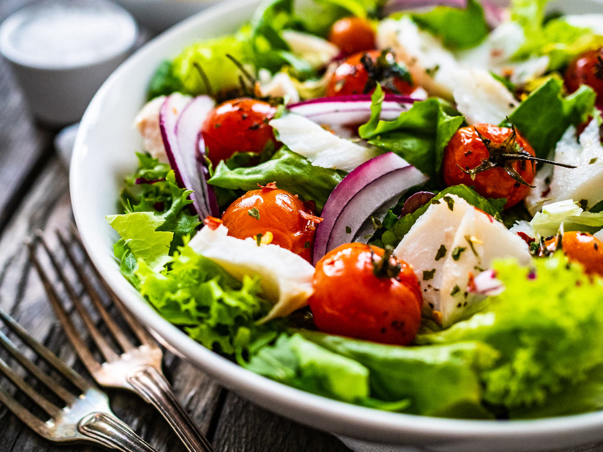 Roast fish and vegetable salad on wooden background Assisted Living & Memory Care Excellence in Staunton | AVIVA Baldwin Park